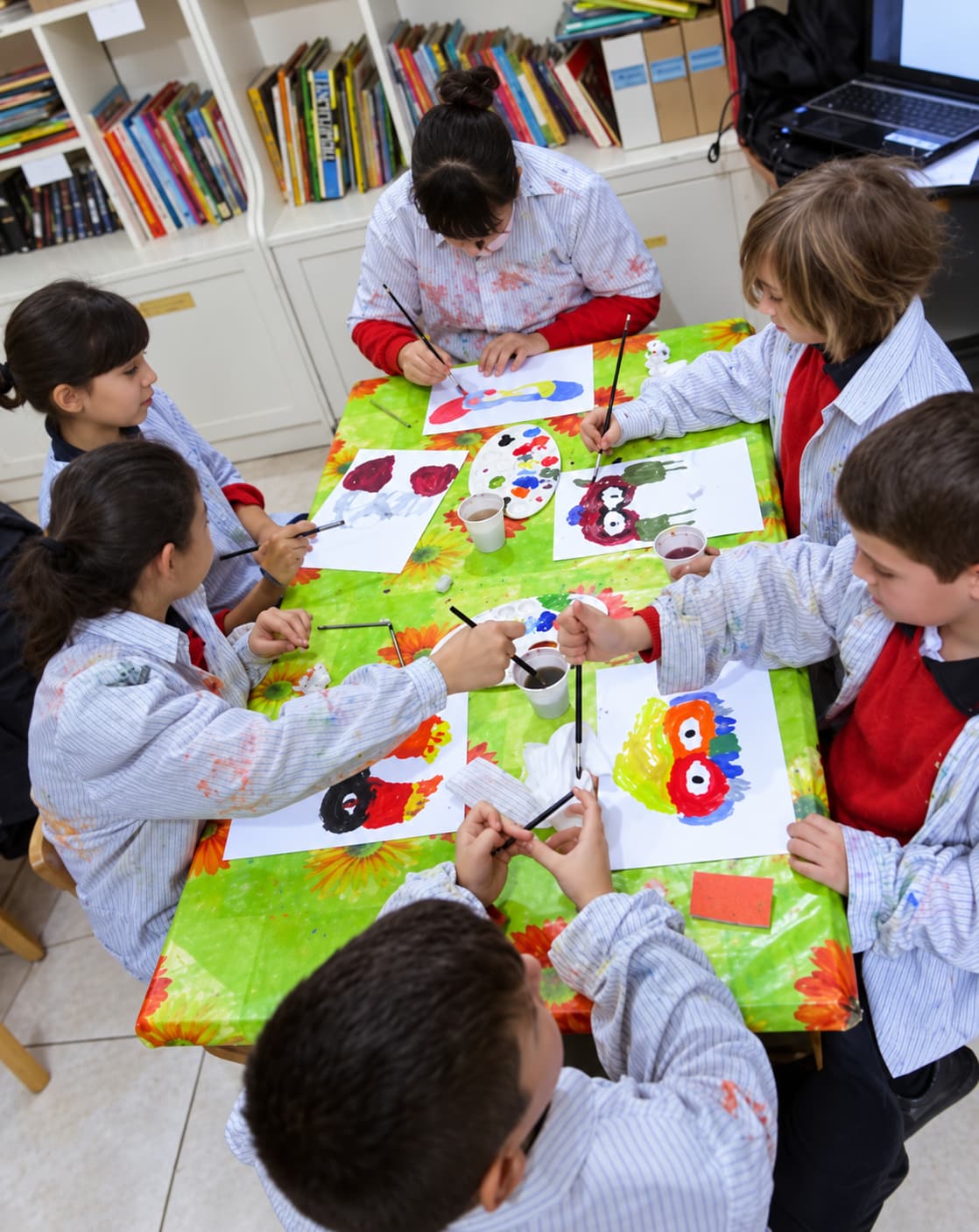 Children painting together at Centru Tbexbix in Bormla, Malta